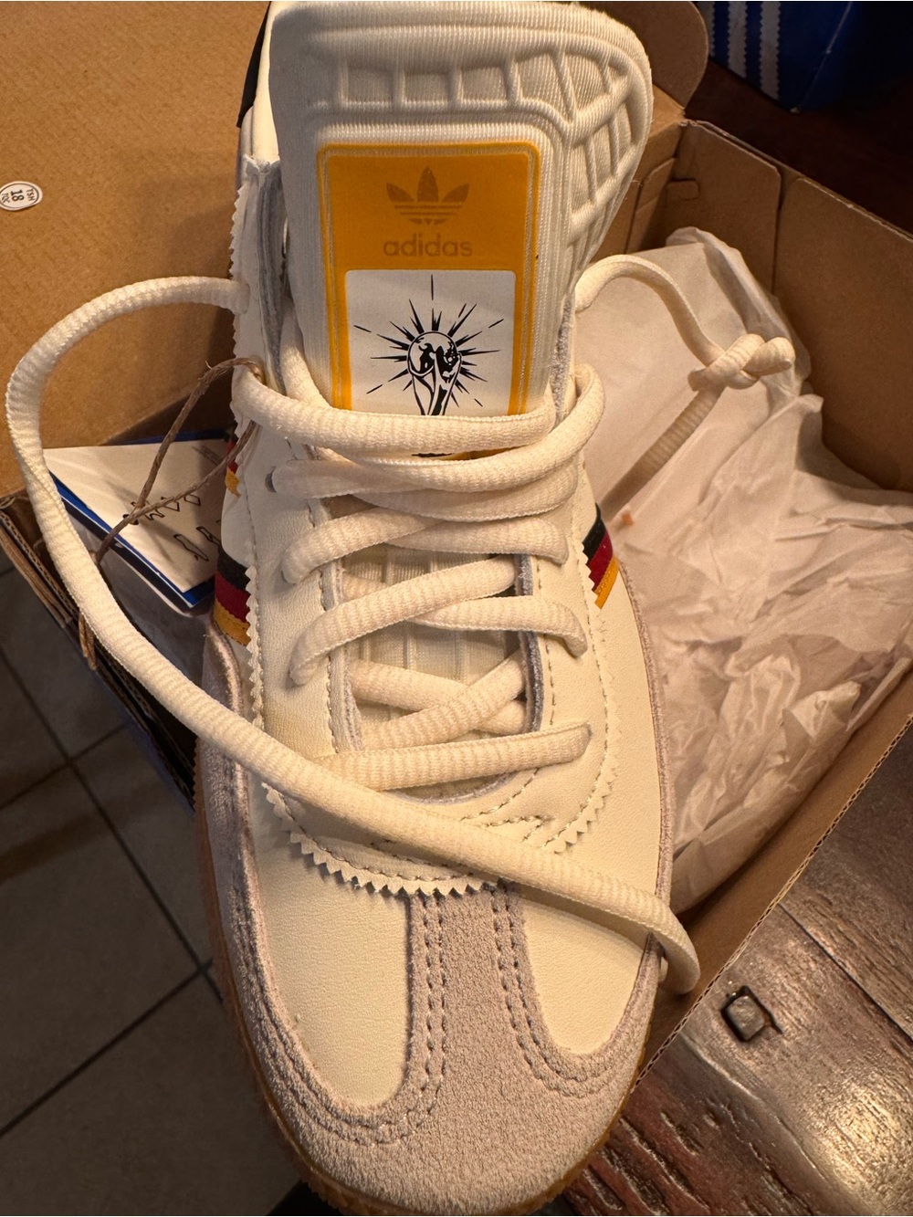 adidas Off-White Sneakers with Red and Yellow Stripes